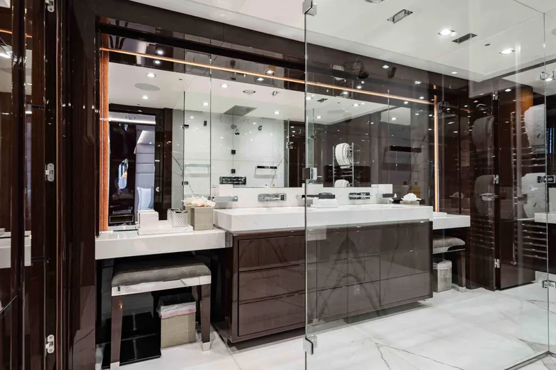  Yacht Photos Pics Luxurious bathroom interior on 2016 Sunseeker 131 Yacht with modern fixtures and elegant design.