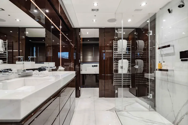  Yacht Photos Pics Luxurious bathroom on 2016 Sunseeker 131 Yacht with modern fixtures and elegant design.