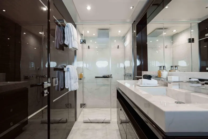  Yacht Photos Pics Luxurious bathroom on 2016 Sunseeker 131 Yacht with modern fixtures and elegant design.