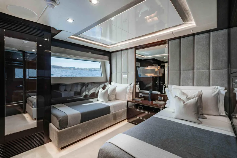  Yacht Photos Pics Luxurious bedroom interior of 2016 Sunseeker 131 Yacht with ocean view.
