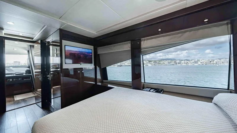  Yacht Photos Pics Luxurious Sunseeker 131 Yacht 2016 bedroom with ocean view and modern interior.
