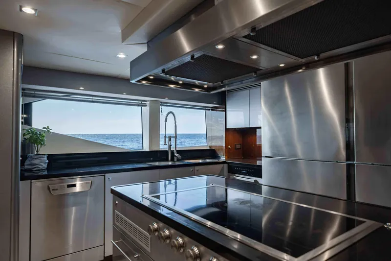  Yacht Photos Pics Luxurious kitchen interior of 2016 Sunseeker 131 Yacht with ocean view.