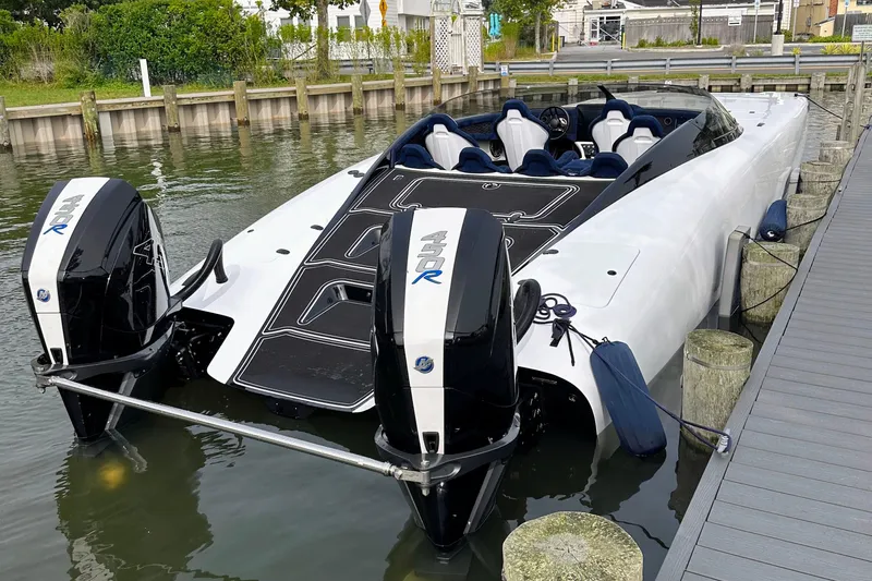  Yacht Photos Pics 2023 Doug Wright 36 powerboat docked with twin Merc 450 Racing engines.
