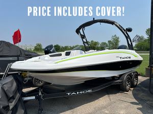 2023 Tahoe 1950 boat on trailer, includes cover, white and green design, outdoor setting.