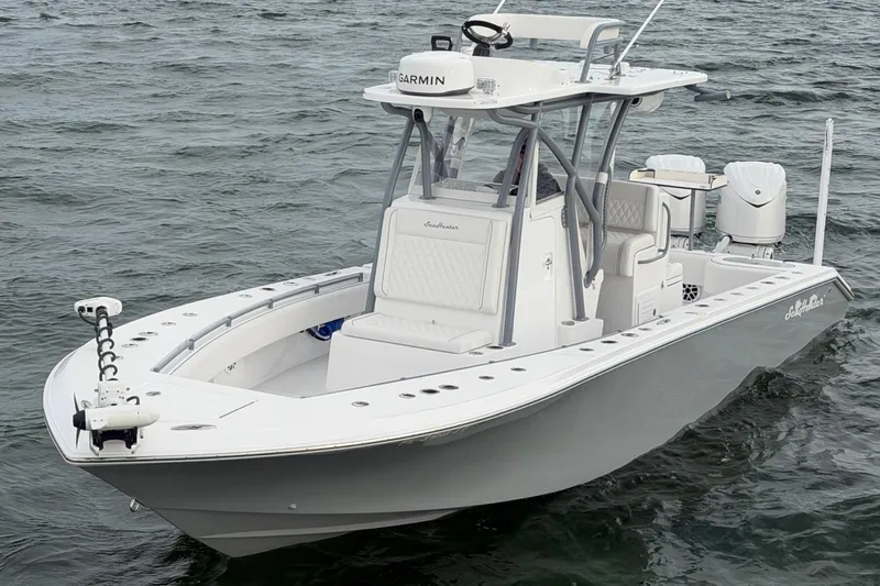  Yacht Photos Pics 2024 SeaHunter 28 Floridian boat on water, featuring sleek design and advanced equipment.