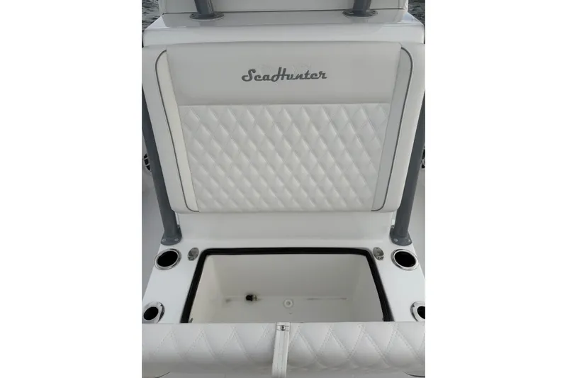  Yacht Photos Pics 2024 SeaHunter 28 Floridian boat seat with diamond-stitched upholstery and storage compartment.