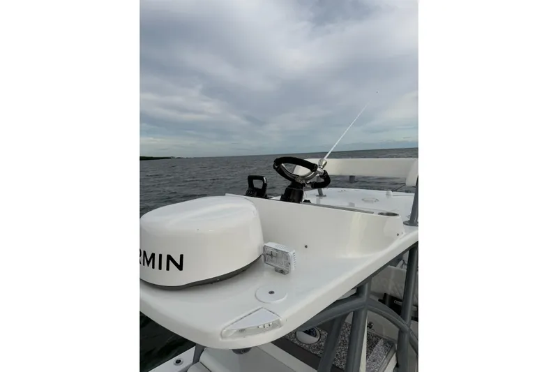  Yacht Photos Pics 2024 SeaHunter 28 Floridian boat helm with Garmin equipment on open water.