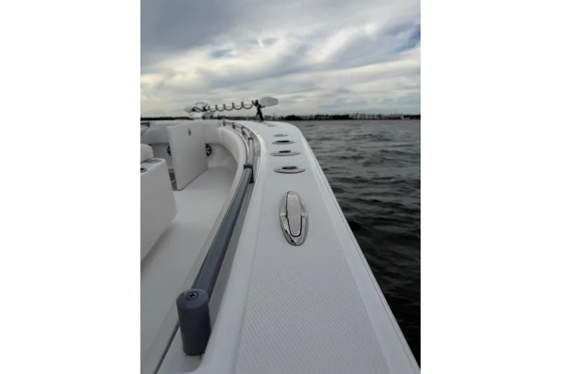  Yacht Photos Pics 2024 SeaHunter 28 Floridian boat on water, showcasing sleek design and modern features.