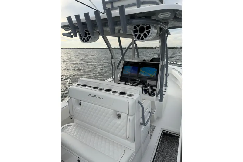  Yacht Photos Pics 2024 SeaHunter 28 Floridian boat interior with advanced navigation system and luxurious seating.