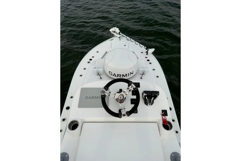  Yacht Photos Pics 2024 SeaHunter 28 Floridian boat helm with Garmin equipment on open water.