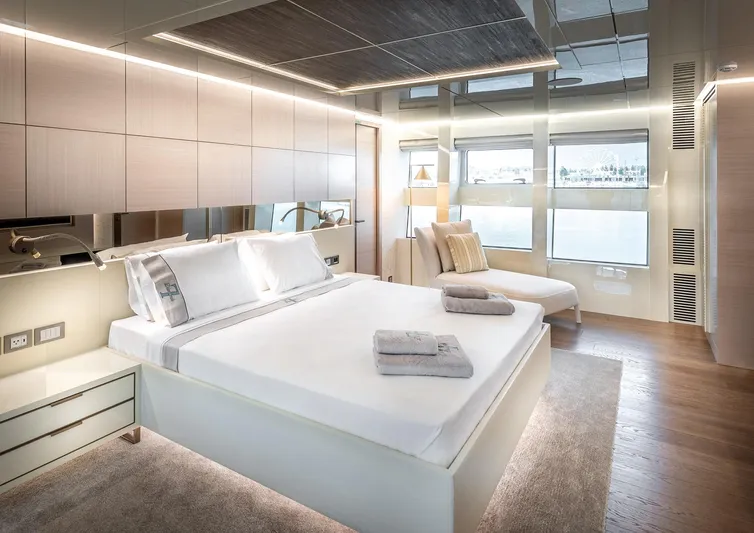 Numarine 32xp Yacht Photos Pics Luxurious bedroom interior on 2026 Numarine 32XP yacht, featuring modern design and large windows.