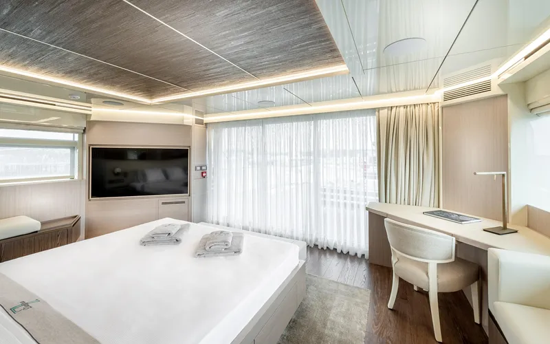 Numarine 32xp Yacht Photos Pics Luxurious bedroom interior of 2026 Numarine 32XP yacht with modern decor and large windows.