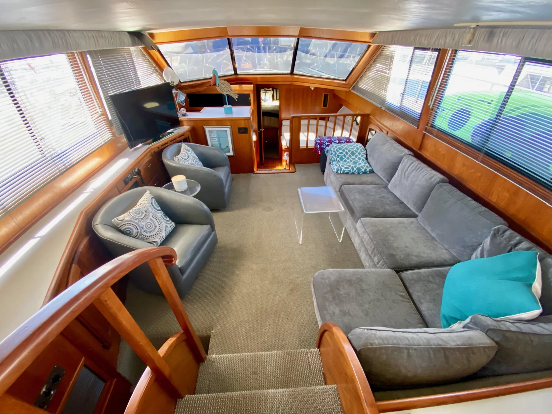 1988 Californian Sundeck Motoryacht interior with cozy seating and panoramic windows.