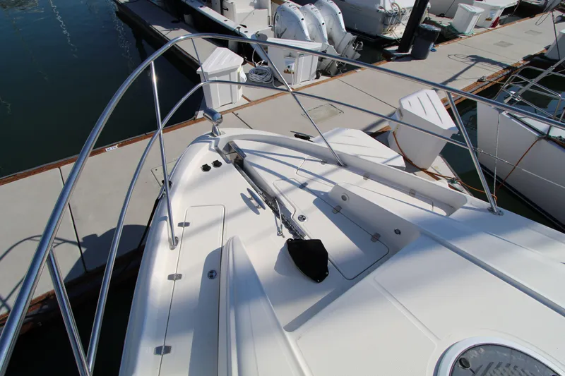  Yacht Photos Pics Bow view of 2002 Regal Commodore 4260 yacht docked at marina.