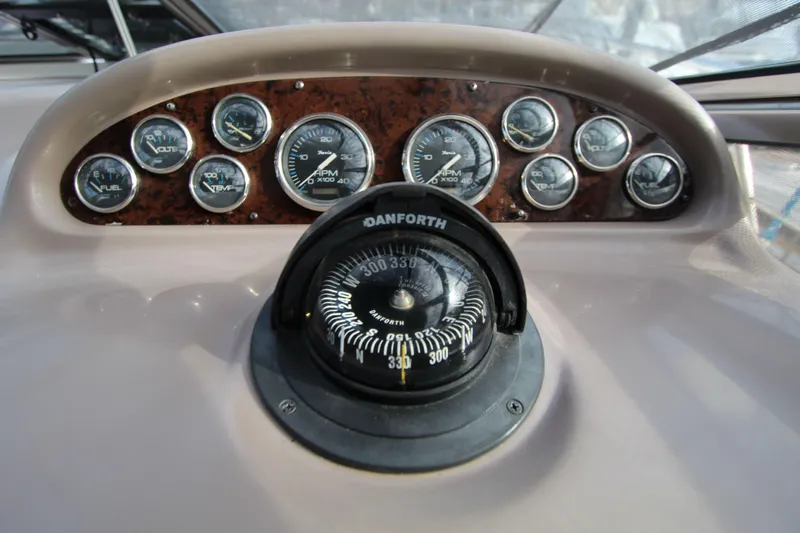  Yacht Photos Pics Dashboard of 2002 Regal Commodore 4260 with gauges and compass.