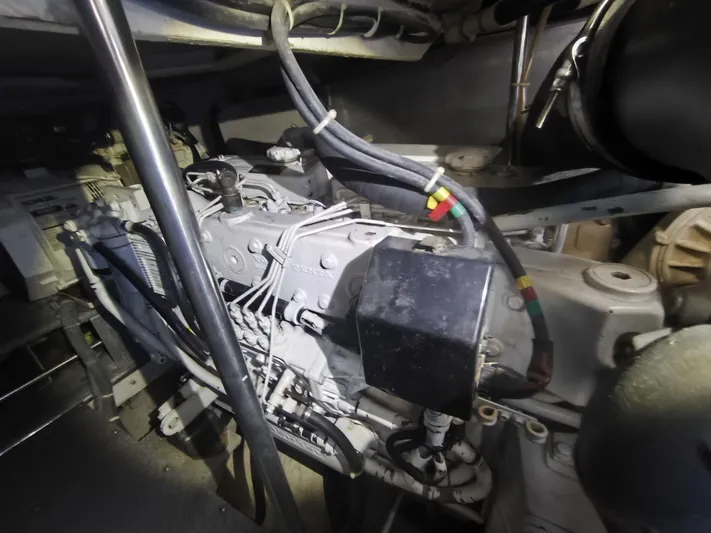  Yacht Photos Pics Engine compartment of a 2002 Regal Commodore 4260 boat, showing detailed machinery components.