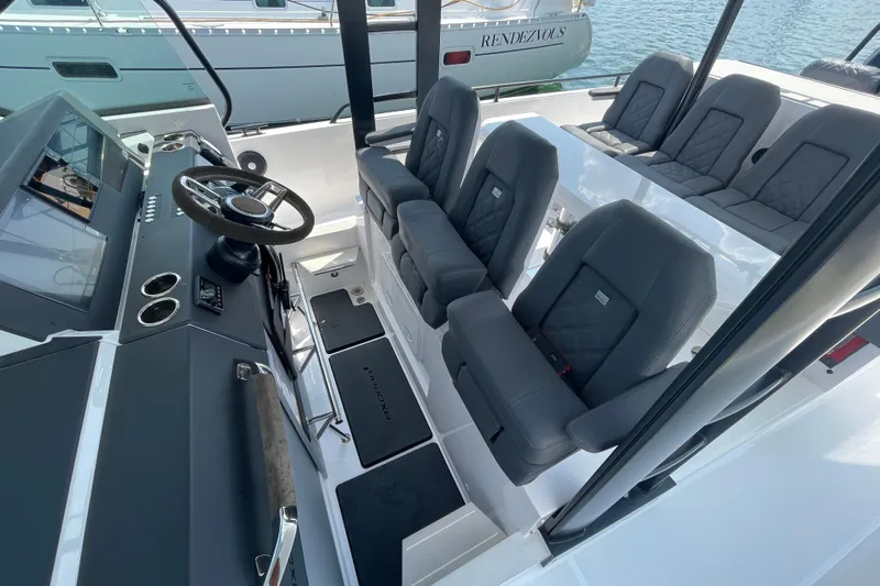  Yacht Photos Pics 2020 Axopar 37 SUN TOP BRABUS interior with sleek seating and modern dashboard.