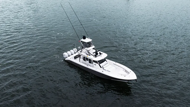  Yacht Photos Pics 2017 Everglades 435 CC boat on open water, aerial view.