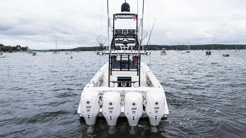 Yacht Photos Pics 2017 Everglades 435 CC boat with four engines on open water.