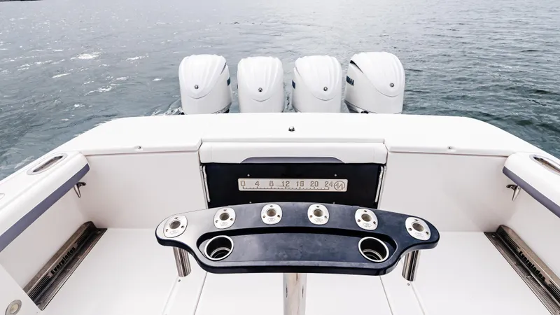  Yacht Photos Pics 2017 Everglades 435 CC boat with four powerful outboard engines on open water.