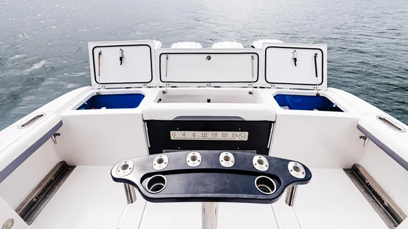  Yacht Photos Pics 2017 Everglades 435 CC boat deck with fishing rod holders and storage compartments.