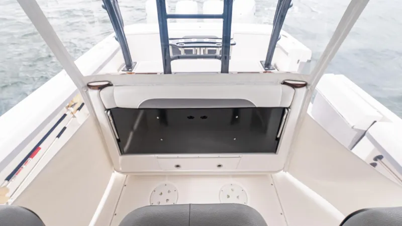  Yacht Photos Pics 2017 Everglades 435 CC boat interior with seating and storage.