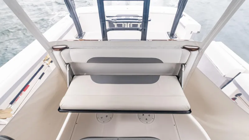  Yacht Photos Pics 2017 Everglades 435 CC boat interior with white seating and helm view.