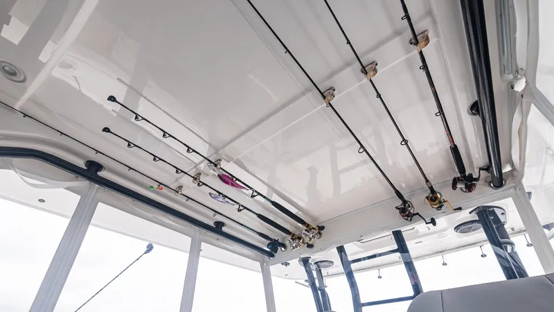  Yacht Photos Pics Fishing rods stored on a 2017 Everglades 435 CC boat ceiling rack.