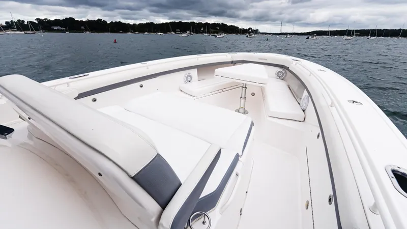  Yacht Photos Pics 2017 Everglades 435 CC boat with spacious seating on calm waters.