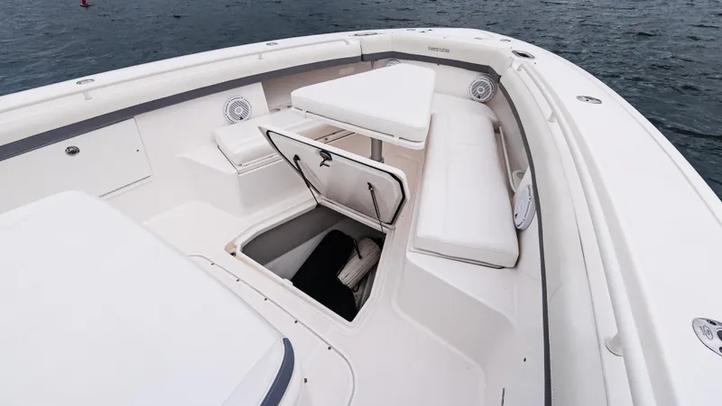  Yacht Photos Pics 2017 Everglades 435 CC boat interior with seating and storage compartment.