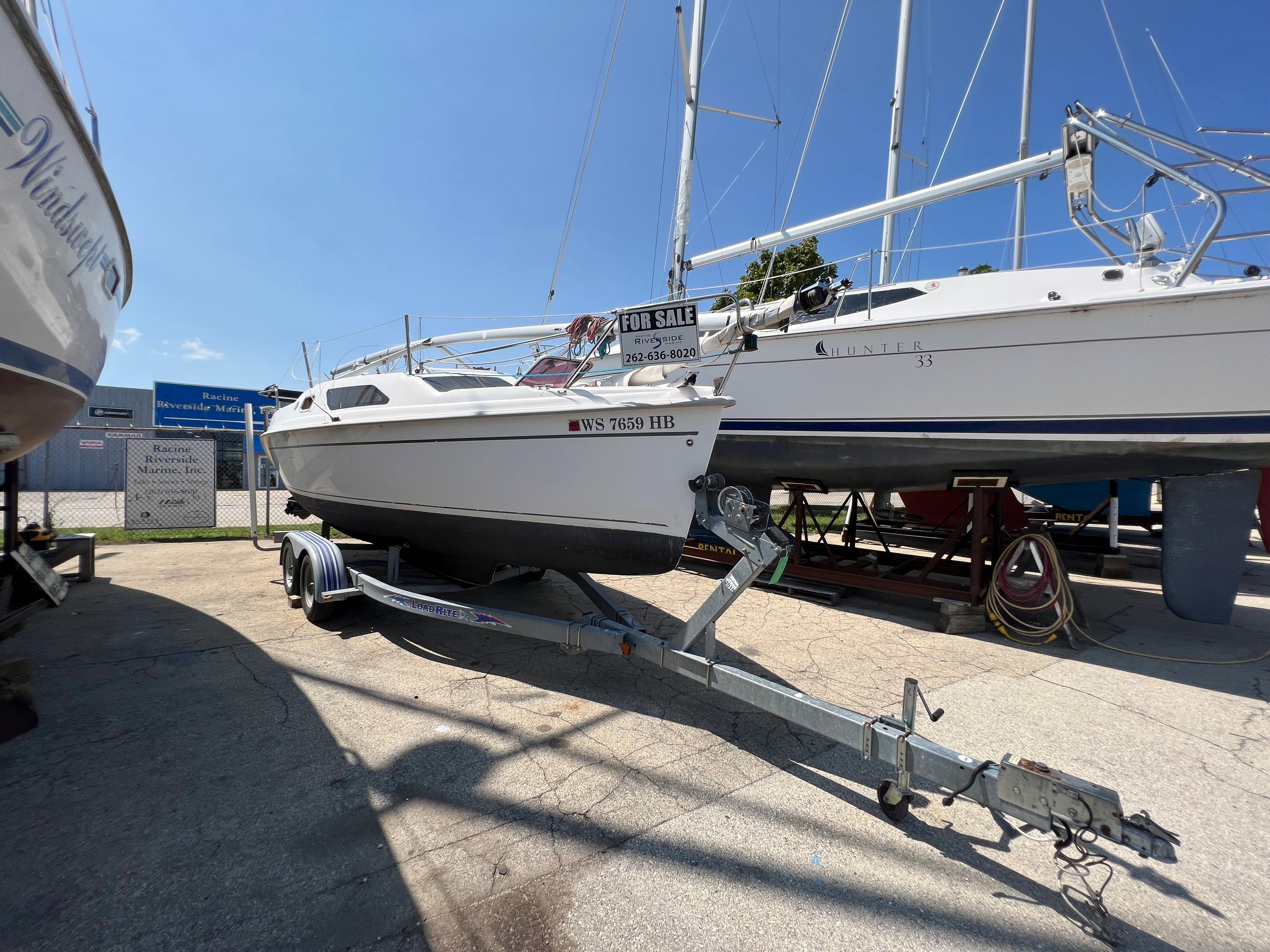 2007 Hunter 25 sailboat on trailer, for sale at marina.