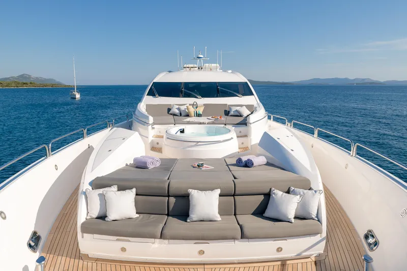  Yacht Photos Pics Luxurious 2008 Sunseeker Predator 108 yacht with sunbathing deck and jacuzzi on open sea.
