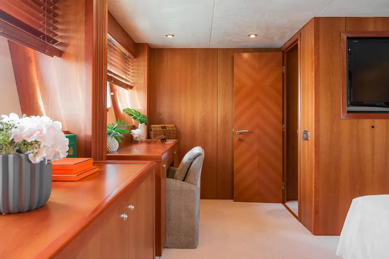  Yacht Photos Pics Luxurious wooden interior of 2008 Sunseeker Predator 108 yacht cabin with elegant decor.