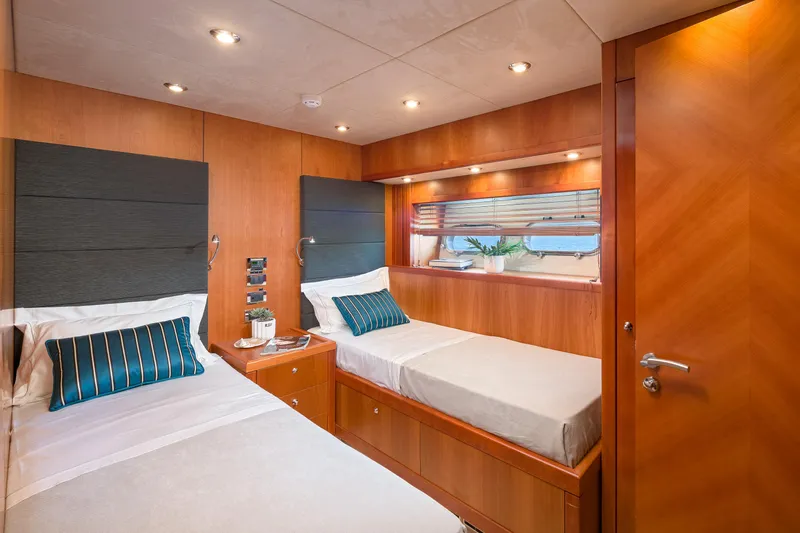  Yacht Photos Pics Luxurious twin cabin interior on 2008 Sunseeker Predator 108 yacht.