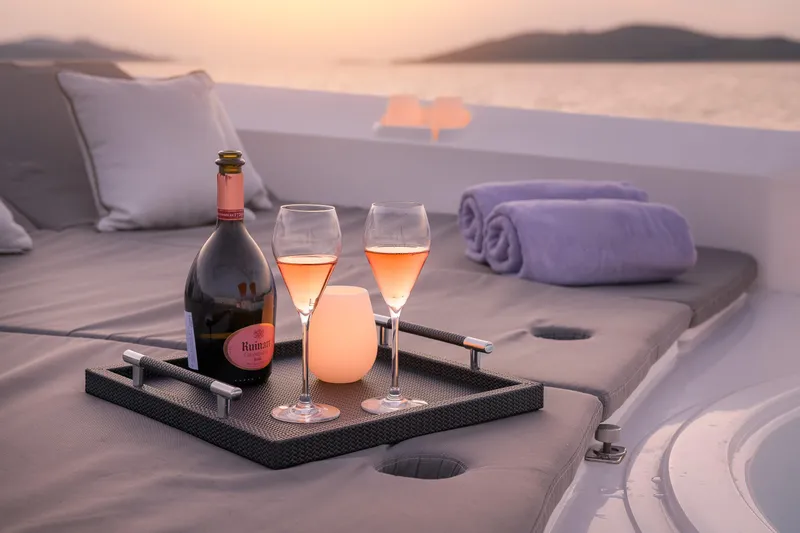  Yacht Photos Pics Luxurious Sunseeker Predator 108 yacht with wine and glasses at sunset, 2008 model.