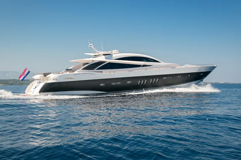  Yacht Photos Pics 2008 Sunseeker Predator 108 yacht cruising on open water.