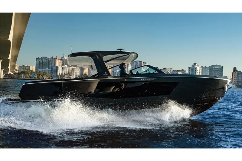  Yacht Photos Pics Manufacturer Provided Image: 2022 Aviara AV40 OB luxury boat cruising on water near cityscape.