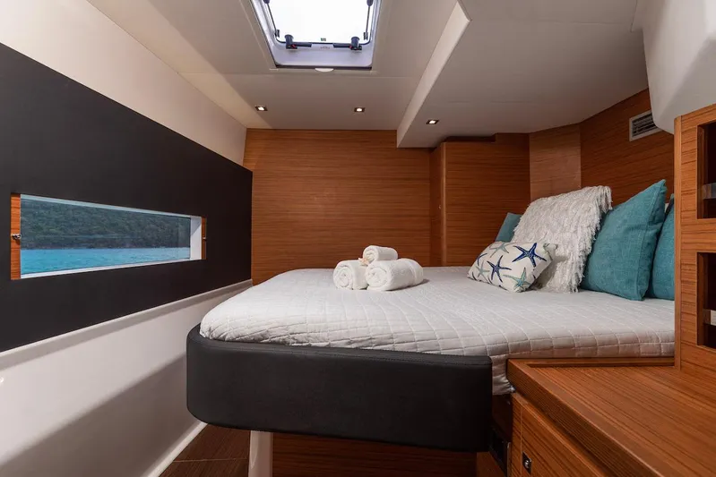  Yacht Photos Pics Luxurious cabin interior of 2021 Dufour Catamarans 48 with modern design and ocean view.