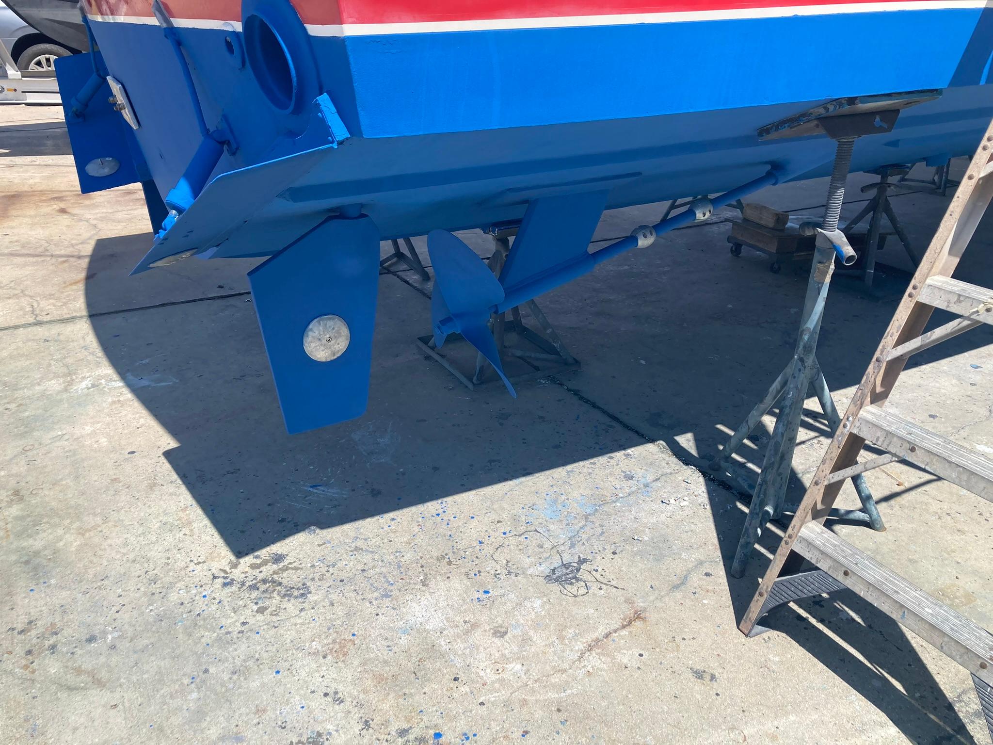 1975 Custom 36 Matlack Tournament SF boat hull on dry dock.