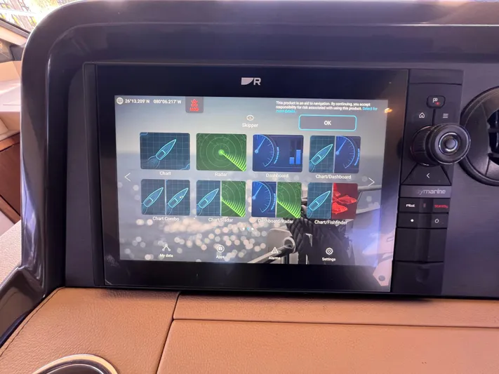  Yacht Photos Pics Touchscreen navigation system on a 2016 Sea Ray 400 Sundancer yacht dashboard.