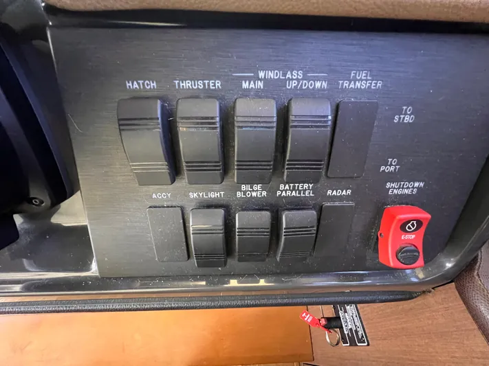  Yacht Photos Pics Control panel of a 2016 Sea Ray 400 Sundancer boat with various switches and controls.