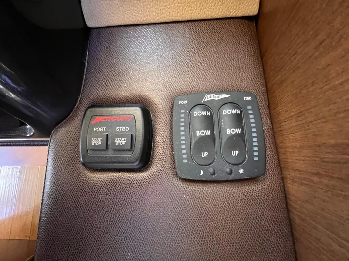  Yacht Photos Pics Control panel of a 2016 Sea Ray 400 Sundancer boat, featuring Mercury and Bennett controls.