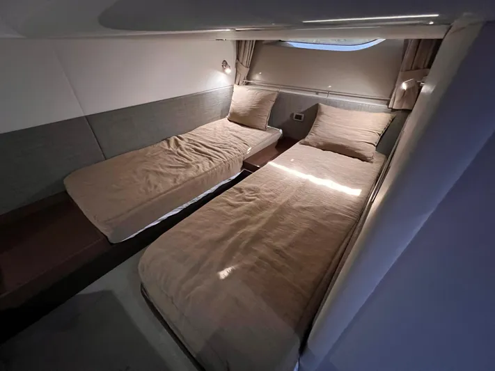  Yacht Photos Pics Interior cabin of 2016 Sea Ray 400 Sundancer with twin beds and modern design.