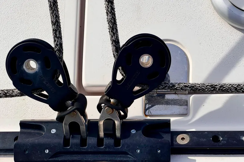 Alegria Yacht Photos Pics Close-up of 2017 Outremer 51 sailboat rigging and pulleys.
