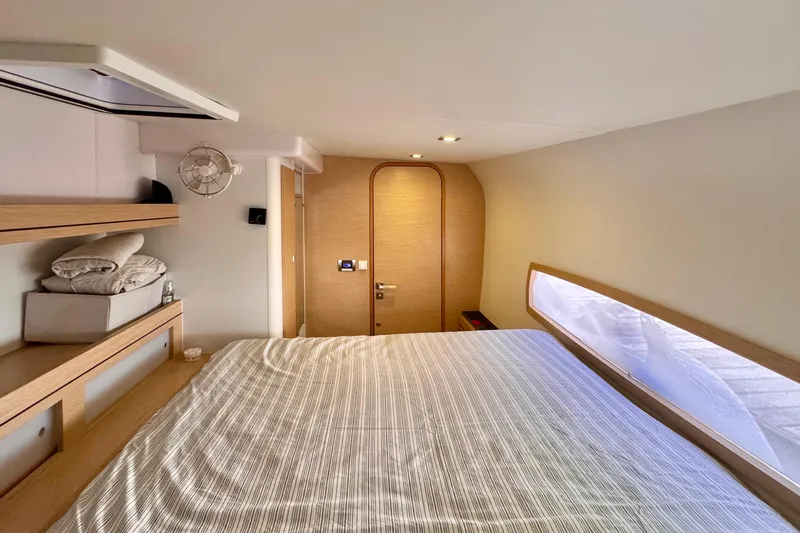 Alegria Yacht Photos Pics Luxurious cabin interior of 2017 Outremer 51 yacht with modern design and cozy bedding.