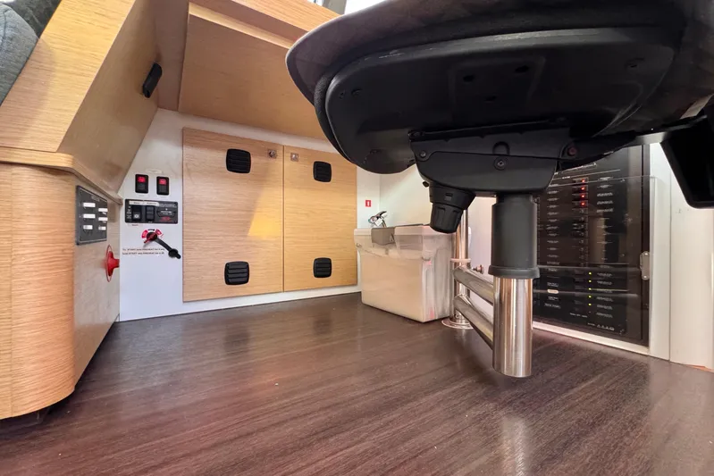 Alegria Yacht Photos Pics Interior of a 2017 Outremer 51 yacht, featuring control panels and storage.