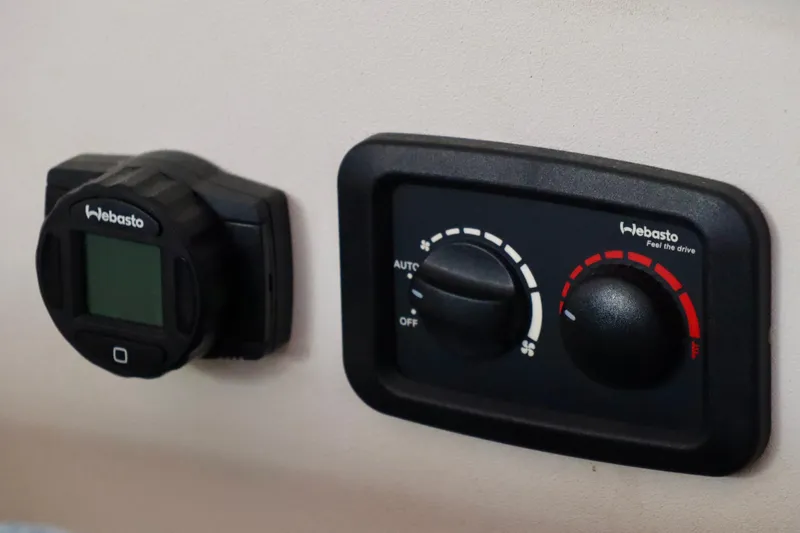 Alegria Yacht Photos Pics Webasto control panel on 2017 Outremer 51 yacht, featuring temperature and fan settings.