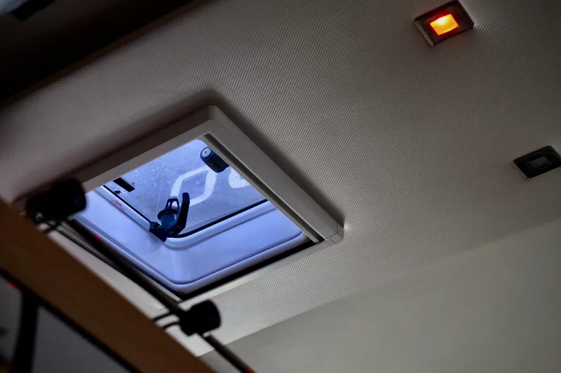 Alegria Yacht Photos Pics Ceiling hatch and light inside 2017 Outremer 51 yacht cabin.