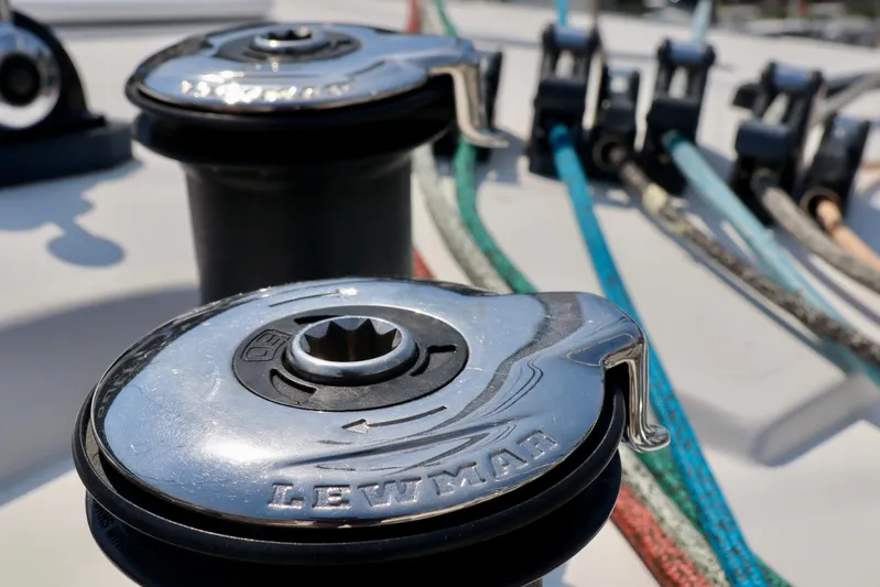 Alegria Yacht Photos Pics Close-up of Lewmar winch on 2017 Outremer 51 sailboat deck with colorful ropes.