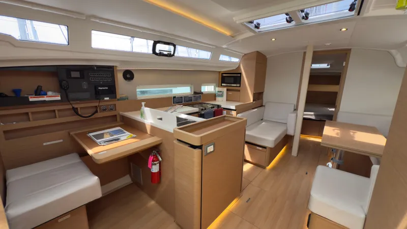  Yacht Photos Pics Interior of 2022 Jeanneau Sun Odyssey 410 sailboat, featuring modern design and spacious layout.
